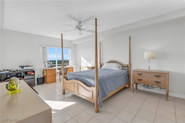 tiled bedroom with ceiling fan