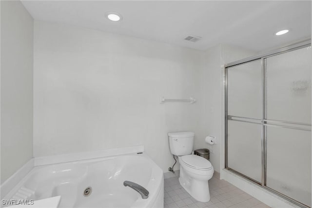 bathroom featuring toilet, separate shower and tub, and tile patterned flooring