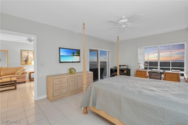 bedroom with ceiling fan, light tile patterned floors, and access to outside