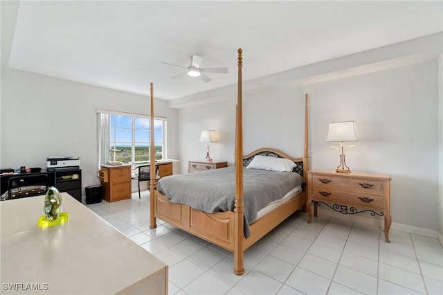 13105 Vanderbilt Dr Unit 802, Naples, FL 34110 - bedroom featuring light tile patterned floors and ceiling fan
