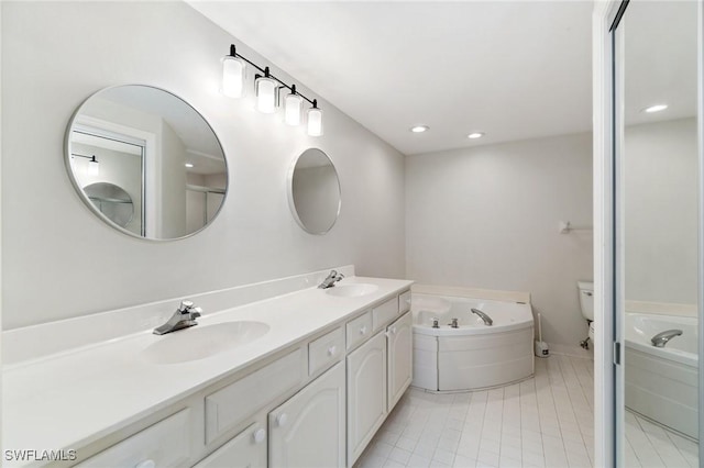 13105 Vanderbilt Dr Unit 802, Naples, FL 34110 - full bath featuring toilet, a bath, double vanity, tile patterned flooring, and recessed lighting