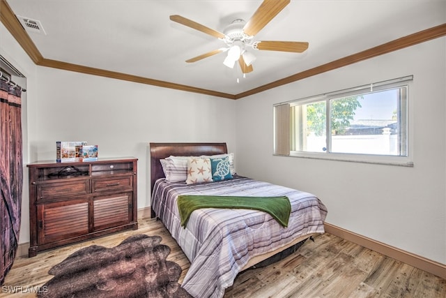 bedroom with ceiling fan, light hardwood / wood-style flooring, and ornamental molding