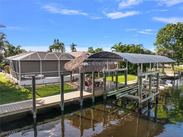 view of dock featuring glass enclosure, a yard, and a water view