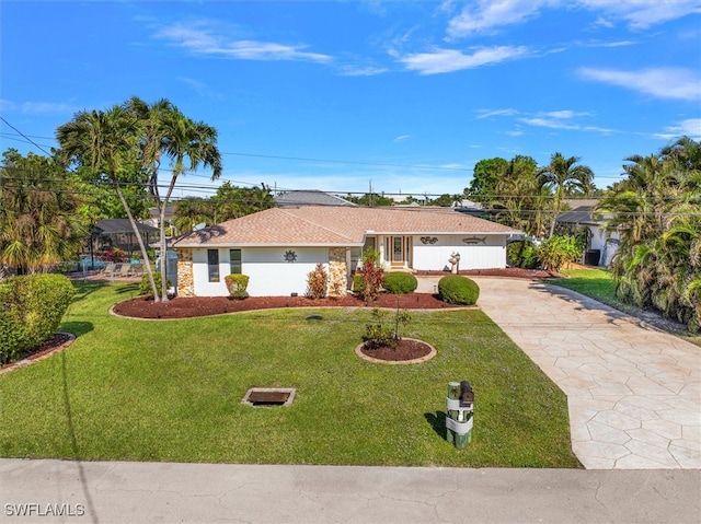 single story home with a front yard