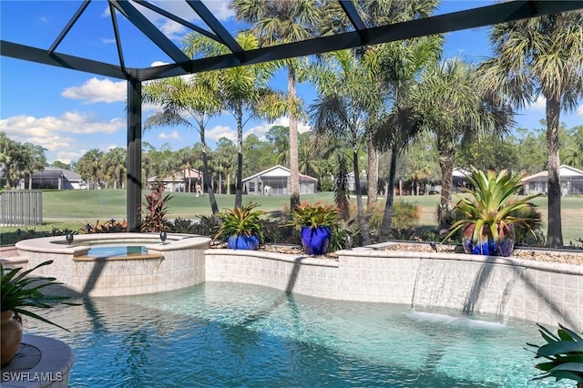 view of swimming pool featuring an in ground hot tub and pool water feature