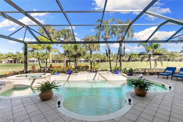 view of pool featuring an in ground hot tub, a patio, and glass enclosure