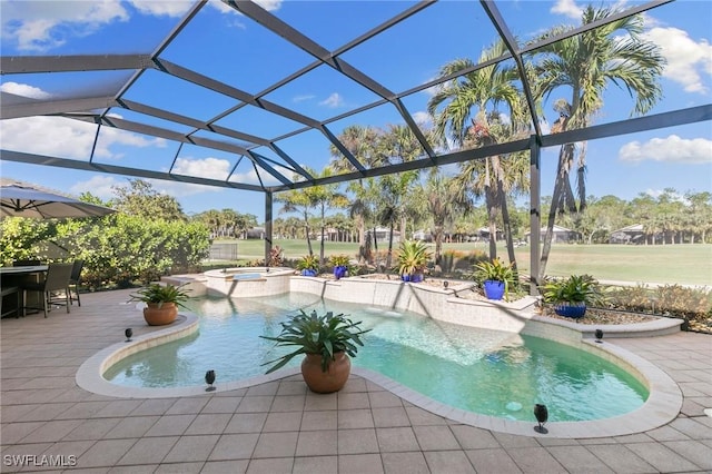 view of pool featuring glass enclosure, an in ground hot tub, and a patio area