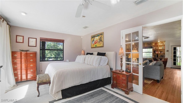 bedroom featuring light wood-type flooring and ceiling fan