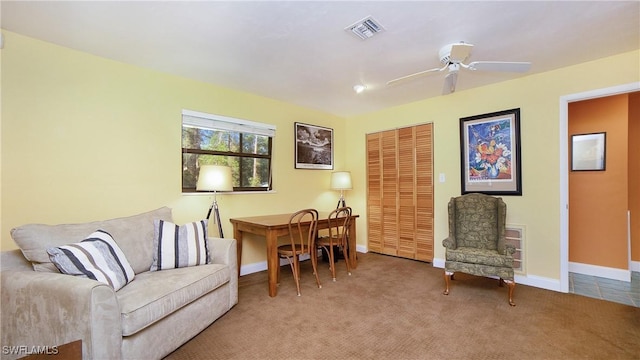 interior space featuring ceiling fan