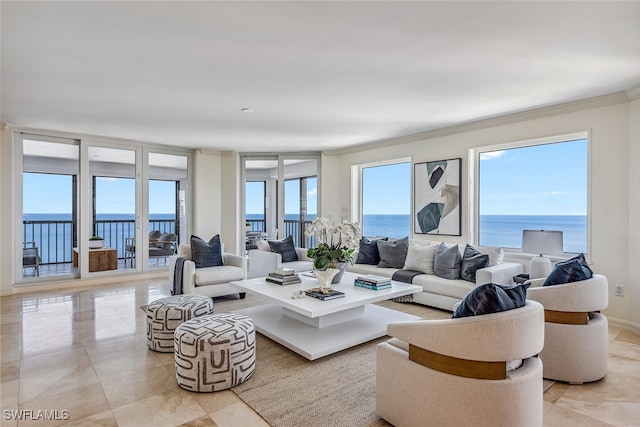 living room with a water view and ornamental molding