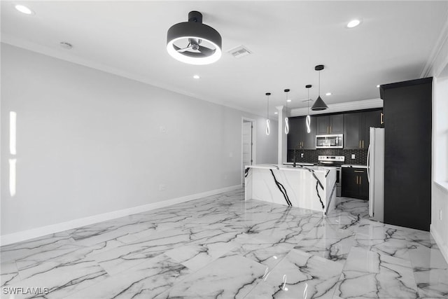 kitchen with white appliances, a kitchen island with sink, hanging light fixtures, crown molding, and tasteful backsplash