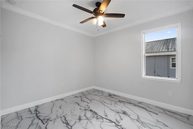 empty room featuring ceiling fan and ornamental molding