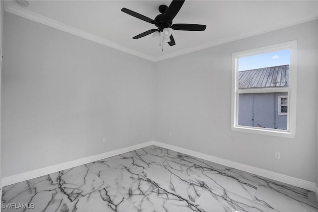 spare room featuring ceiling fan and crown molding