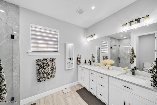 bathroom featuring vanity and walk in shower