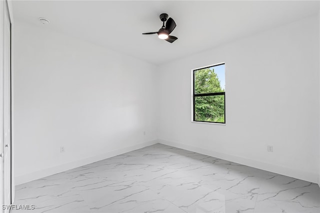 empty room featuring ceiling fan