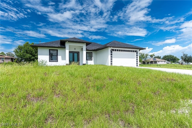 prairie-style house with a garage