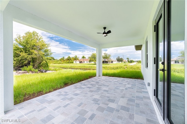 view of patio with ceiling fan