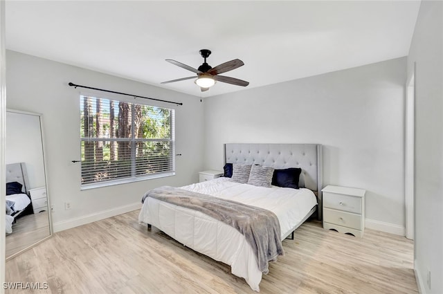 bedroom featuring ceiling fan and light wood-type flooring