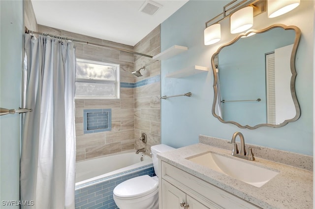 full bathroom with vanity, shower / bath combo, and toilet