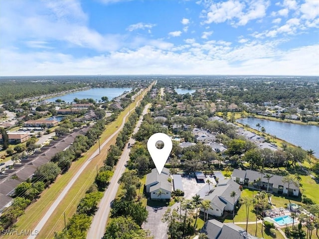 drone / aerial view with a water view