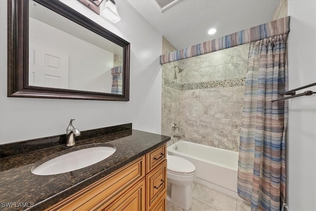 full bathroom featuring tile patterned flooring, vanity, shower / bath combination with curtain, and toilet