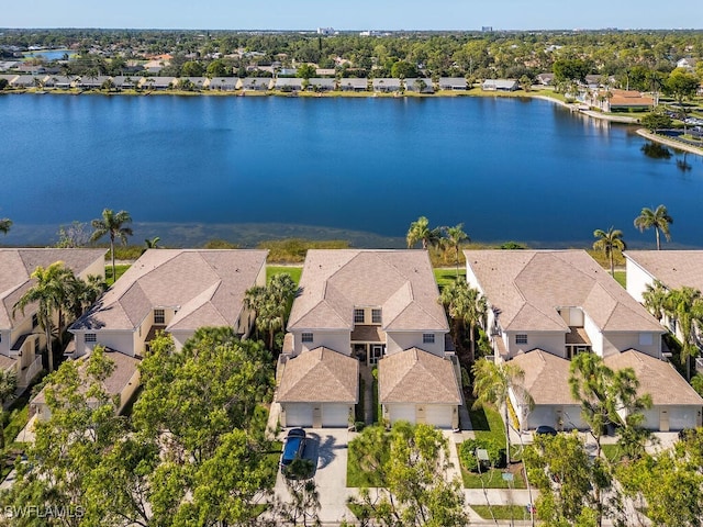 drone / aerial view with a water view