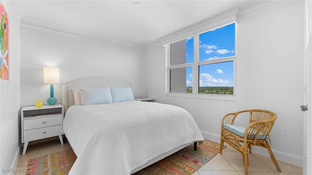 tiled bedroom with ornamental molding