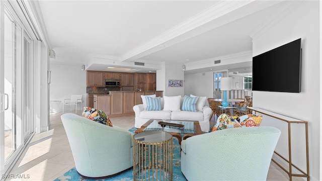 living room featuring beam ceiling, light tile patterned floors, and crown molding