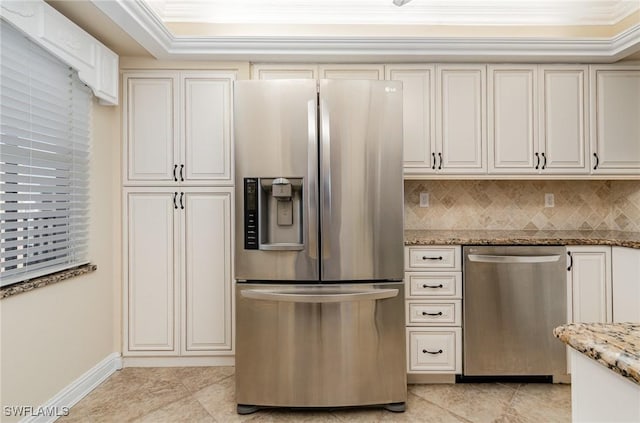 kitchen with light stone countertops, appliances with stainless steel finishes, tasteful backsplash, ornamental molding, and light tile patterned floors