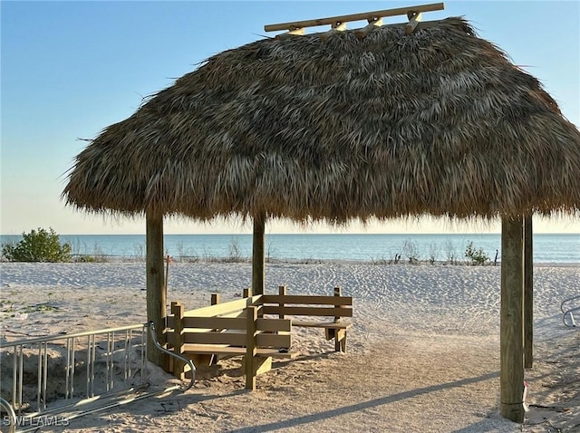 view of water feature with a beach view