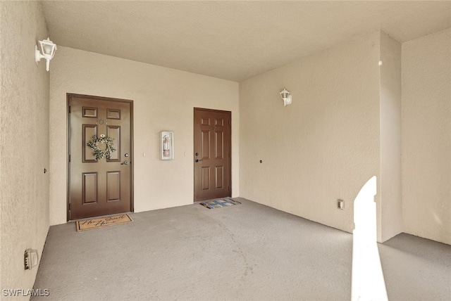 view of exterior entry featuring a porch