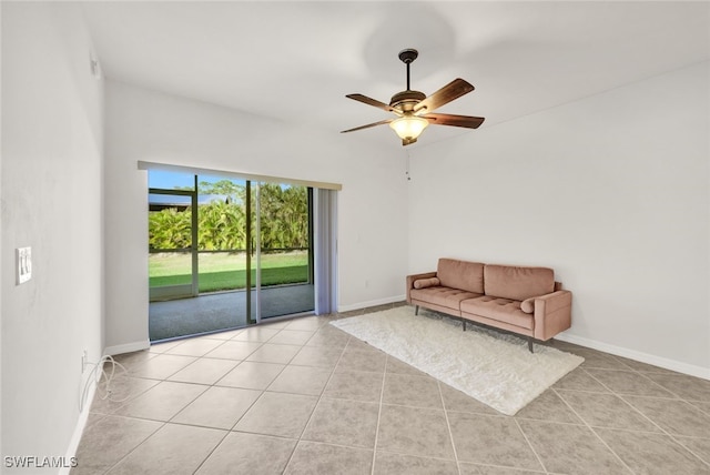 unfurnished room featuring ceiling fan and light tile patterned flooring