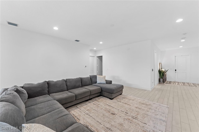 living room with light hardwood / wood-style floors