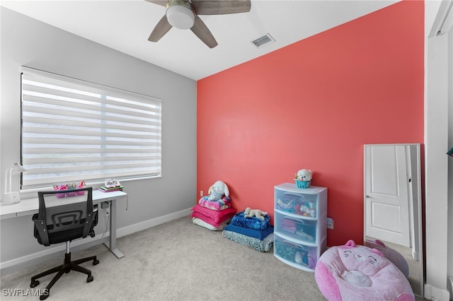 office area with carpet and ceiling fan