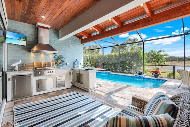 view of swimming pool featuring grilling area, pool water feature, a lanai, area for grilling, and a patio