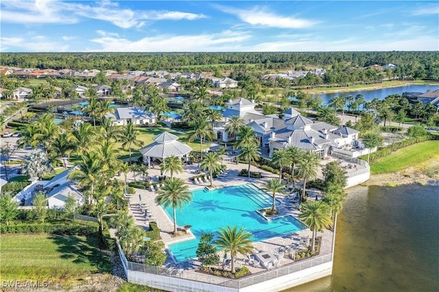 birds eye view of property featuring a water view