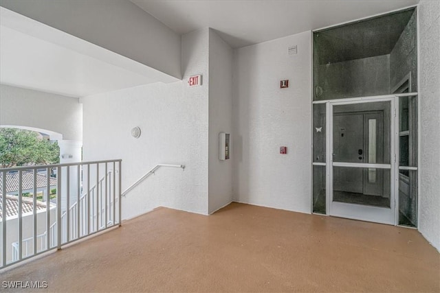 interior space featuring concrete flooring