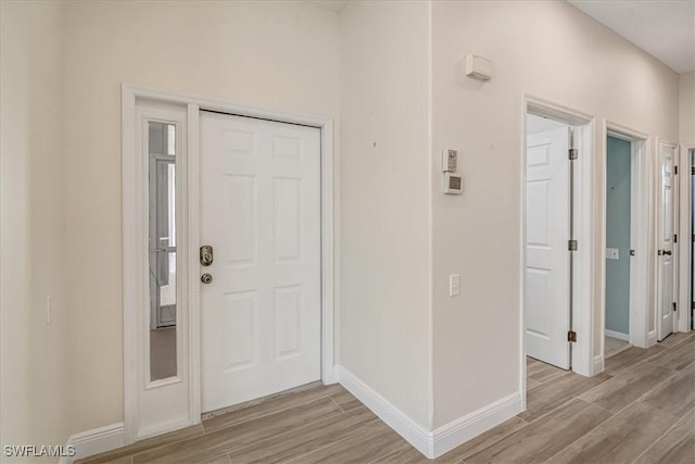 entrance foyer featuring light hardwood / wood-style floors