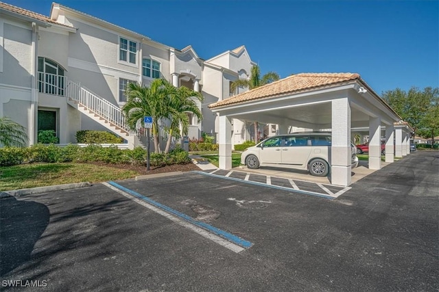 view of car parking with a carport