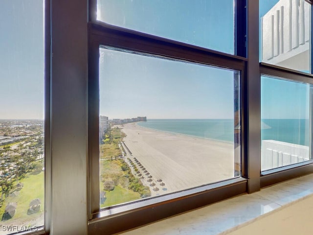 property view of water featuring a beach view