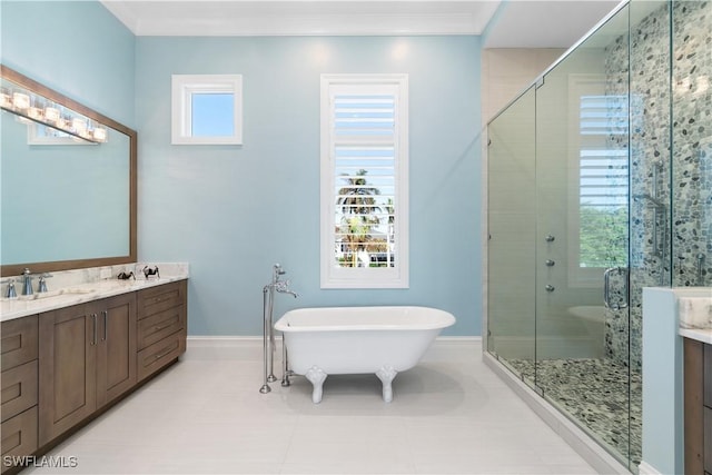 bathroom with tile patterned floors, crown molding, vanity, and shower with separate bathtub