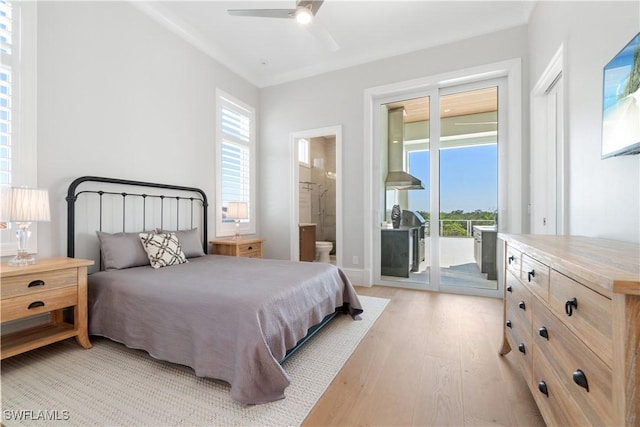 bedroom featuring access to exterior, connected bathroom, light hardwood / wood-style flooring, and ceiling fan