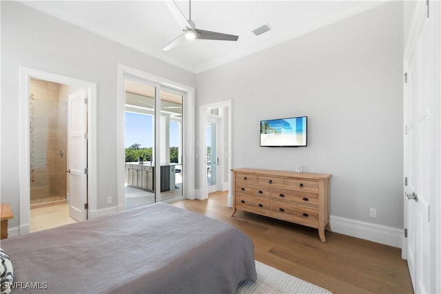 bedroom featuring access to exterior, ensuite bathroom, ceiling fan, and light hardwood / wood-style floors