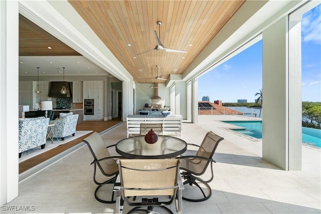 view of patio featuring ceiling fan