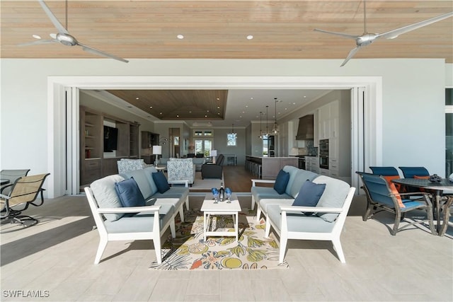 view of patio / terrace featuring outdoor lounge area and ceiling fan