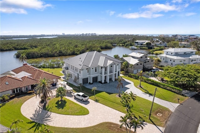 birds eye view of property featuring a water view