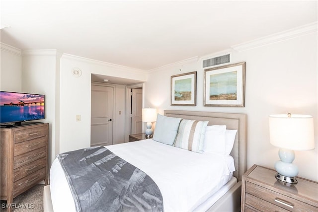 bedroom with ornamental molding