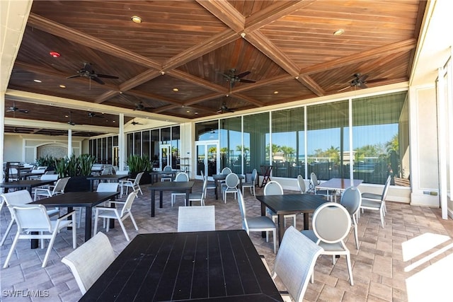 view of patio featuring ceiling fan