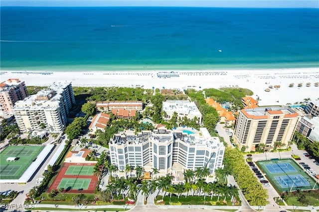 aerial view featuring a water view and a beach view