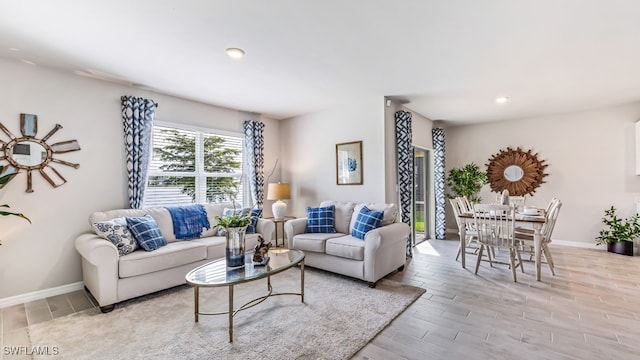 living room with light hardwood / wood-style floors